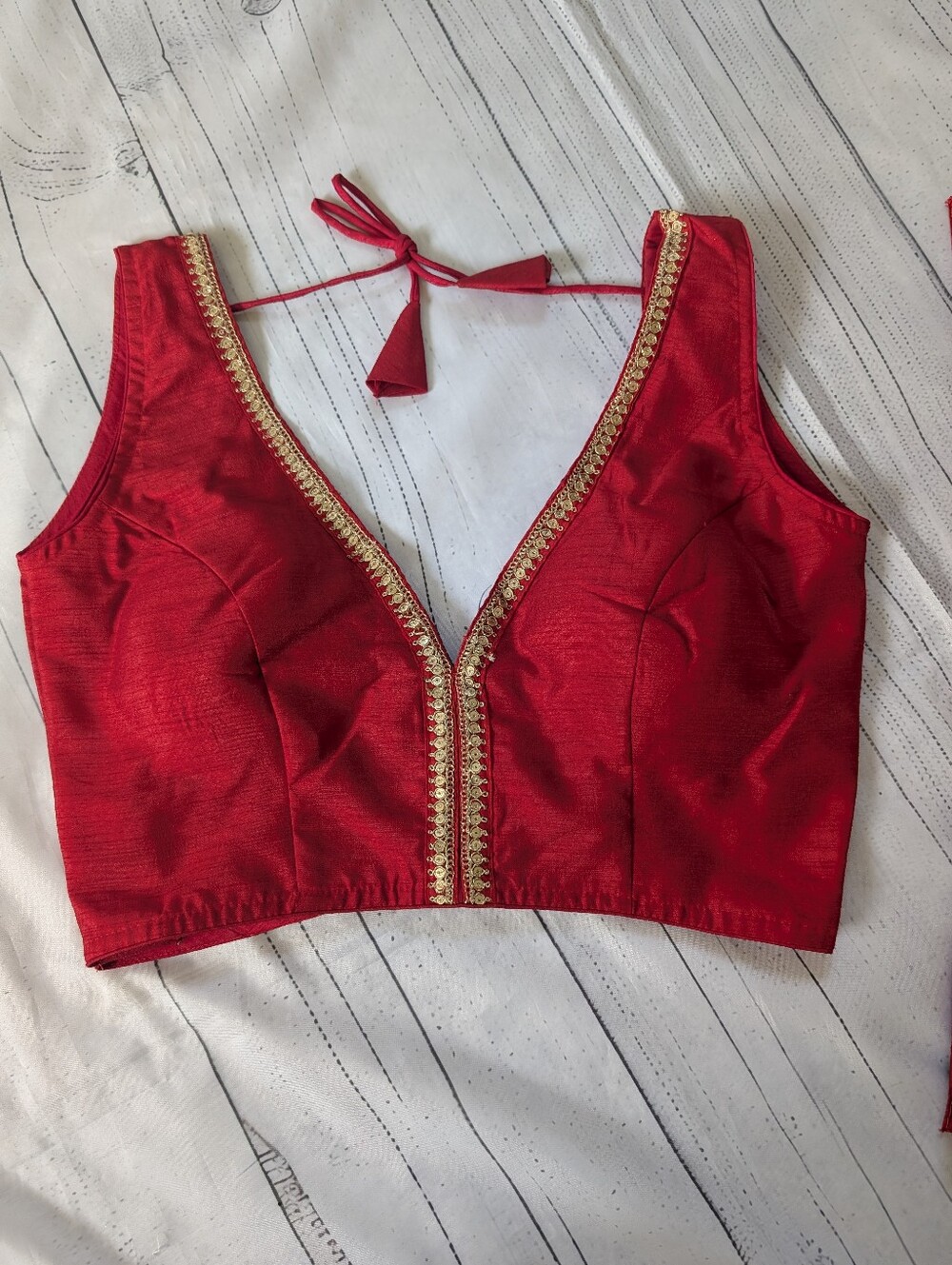 NWOT Readymade Red sleeveless silk saree blouse featuring a deep V-neckline